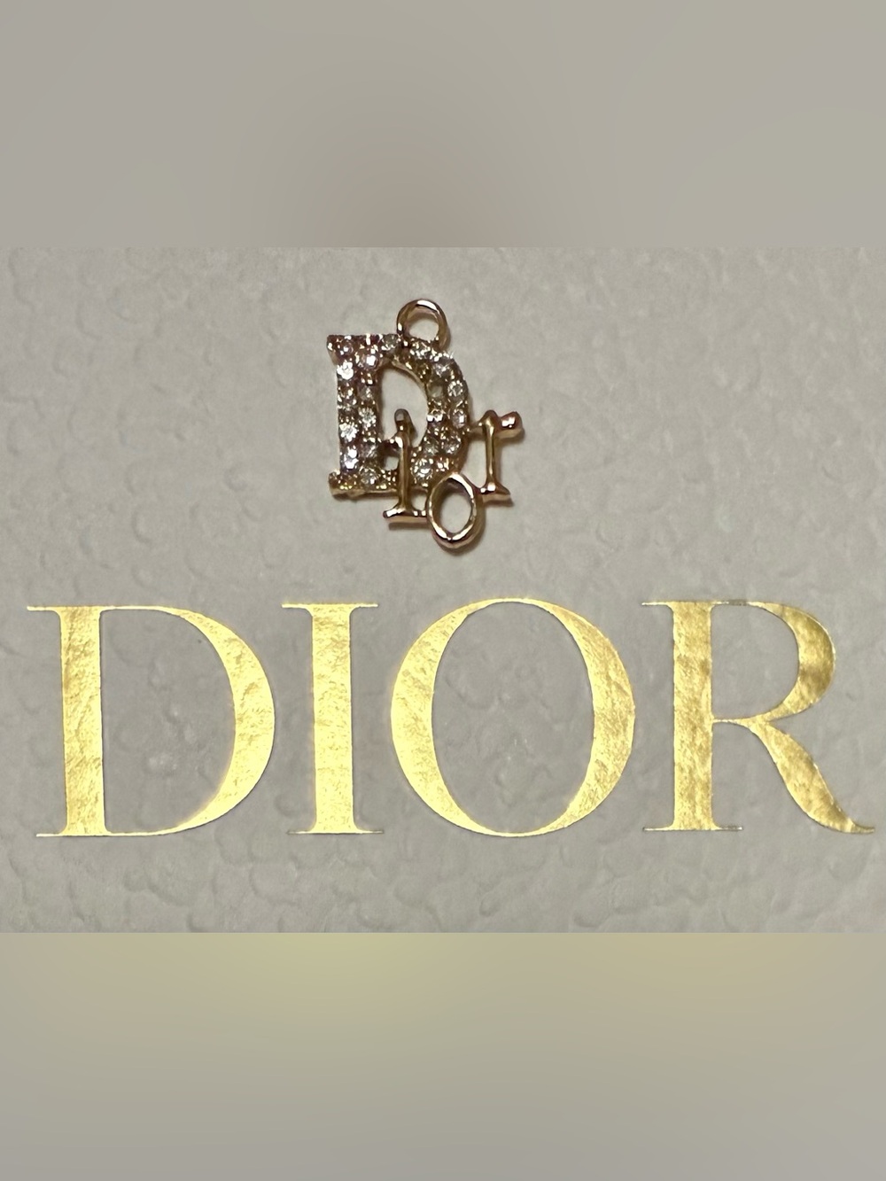 Luxury Style Crystal-Embellished Logo Accent Gold tone Charm Fashion Accessory